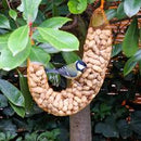 Vogelvoeders Buitenvogels Pindaslinger ± 400 gram, gevuld met doppinda’s.